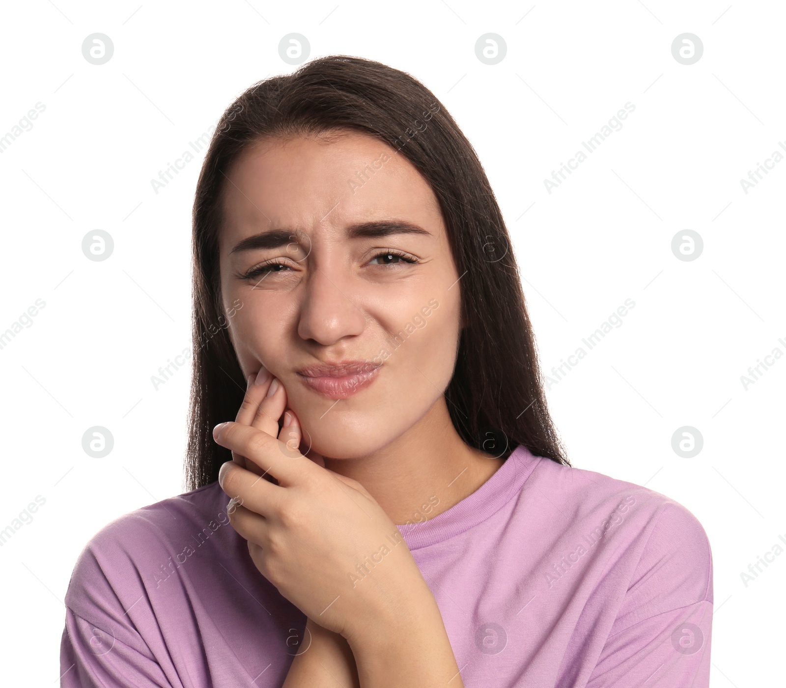 Photo of Young woman suffering from toothache on white background