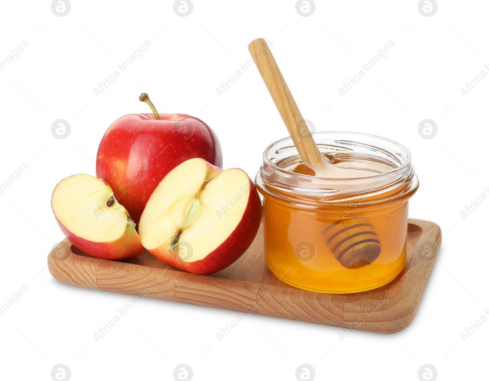 Photo of Delicious apples, jar of honey and dipper isolated on white