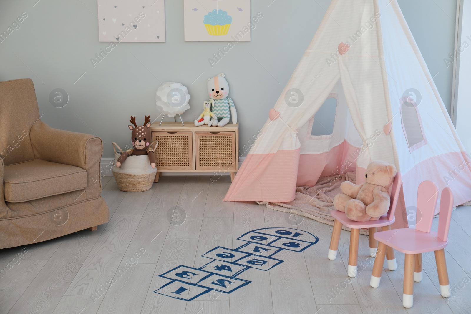 Photo of Beautiful child's room with blue hopscotch floor sticker