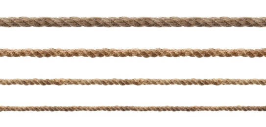 Set of hemp ropes on white background