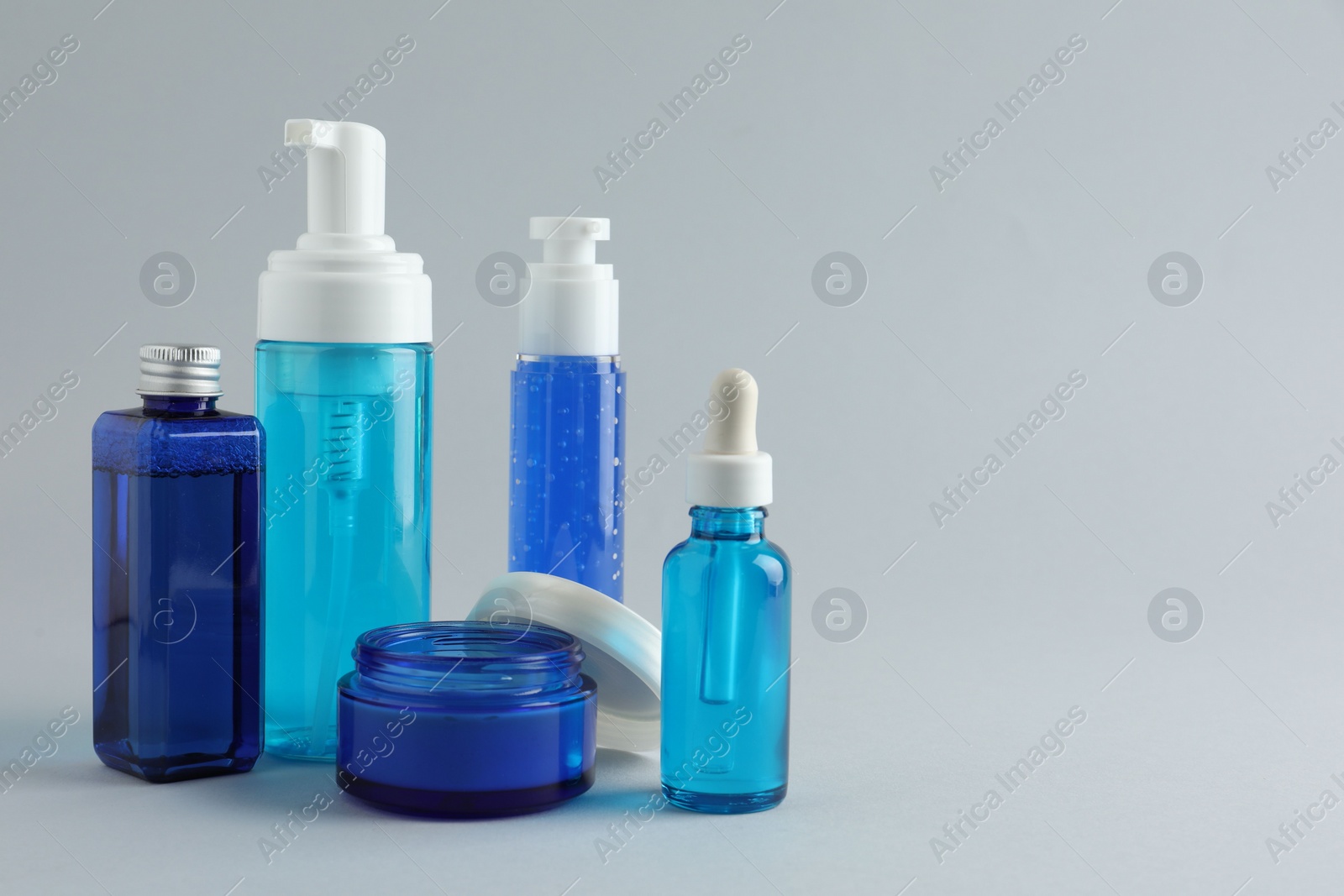 Photo of Set of luxury cosmetic products on white background. Space for text