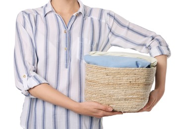 Photo of Woman with basket full of clean laundry on white background, closeup