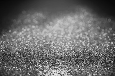 Image of Shiny silver glitter as background. Bokeh effect