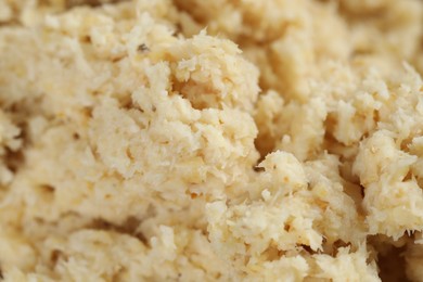 Photo of Tasty prepared horseradish as background, closeup view