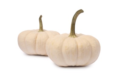 Photo of Two ripe beige pumpkins isolated on white