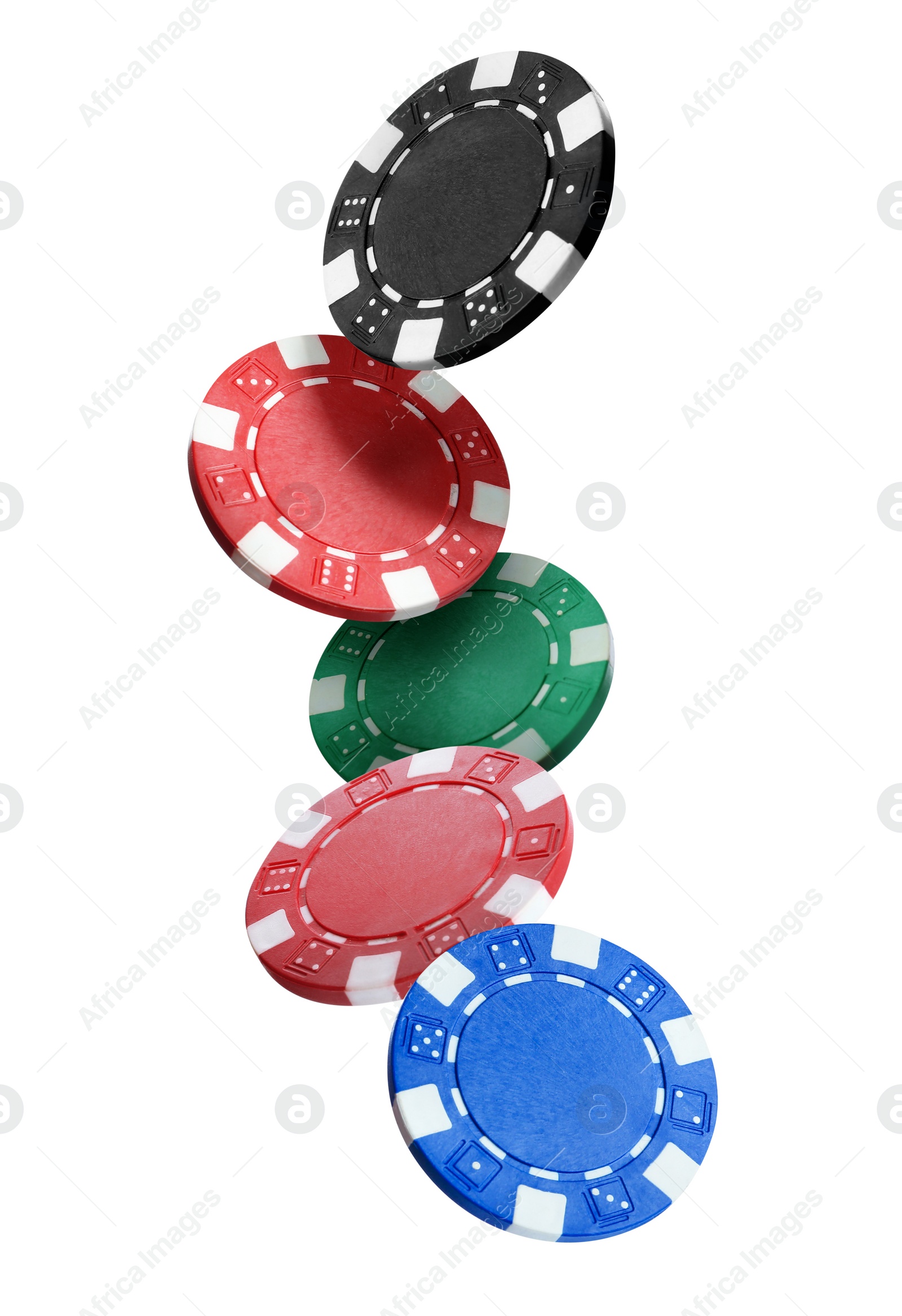 Image of Different casino chips falling on white background