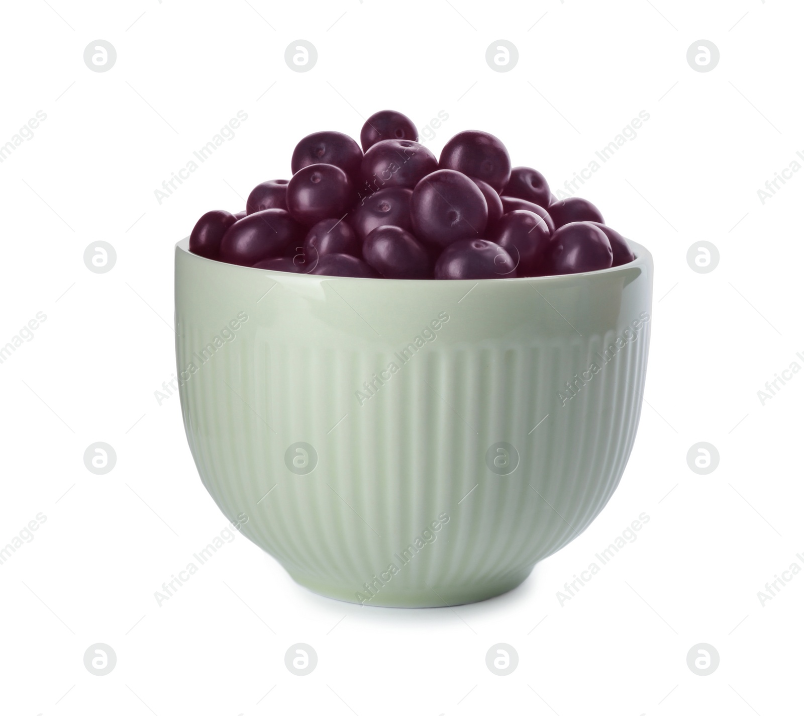 Photo of Fresh acai berries in bowl isolated on white