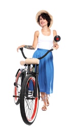 Photo of Portrait of beautiful young woman with bicycle on white background