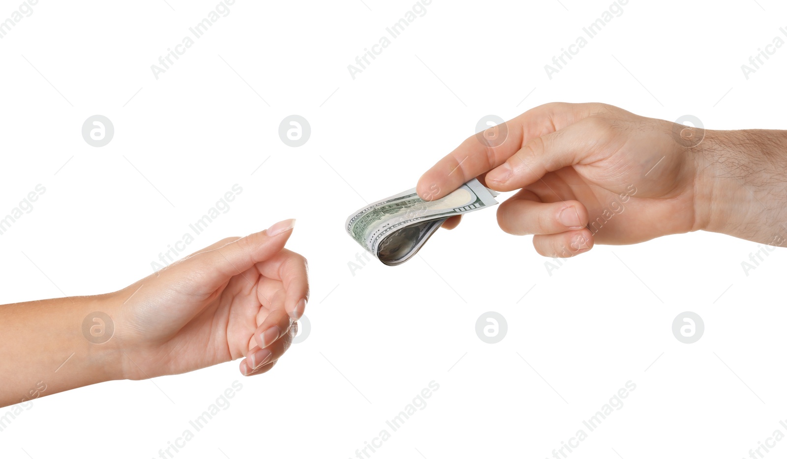 Photo of Man giving dollar bills to woman on white background, closeup