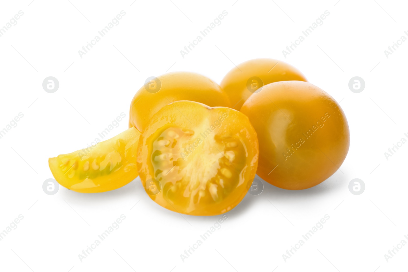 Photo of Cut ripe yellow tomatoes isolated on white