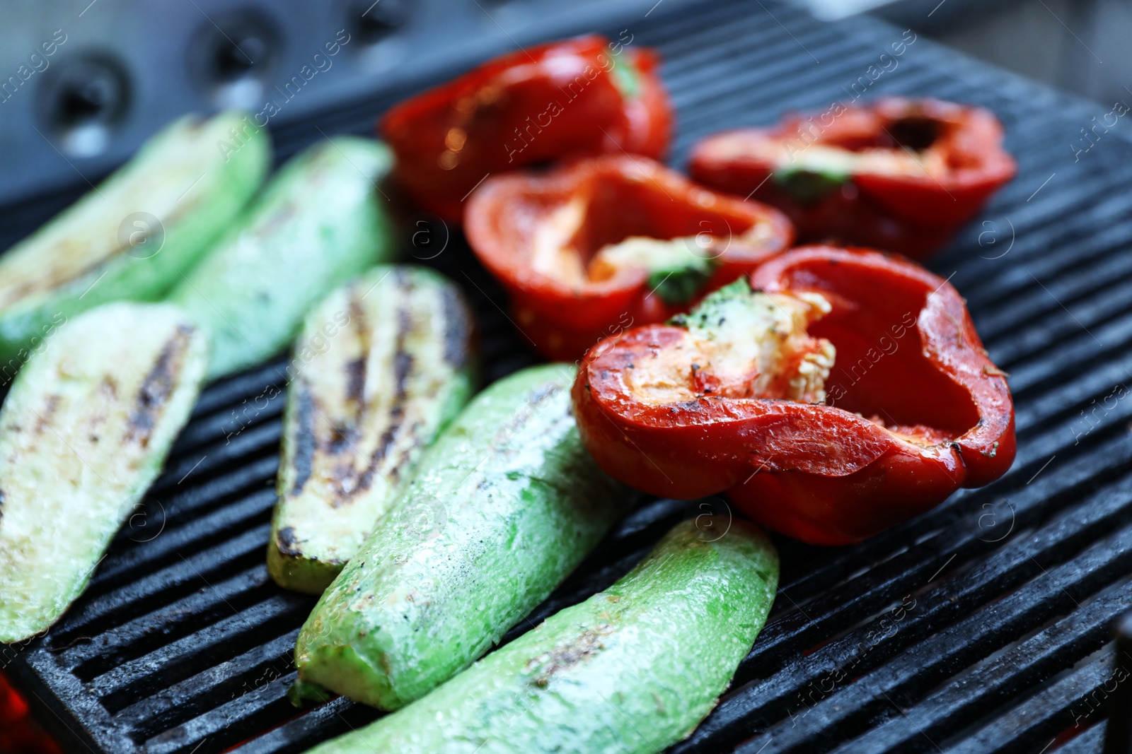 Photo of Grill with cut vegetables. Delicious street food