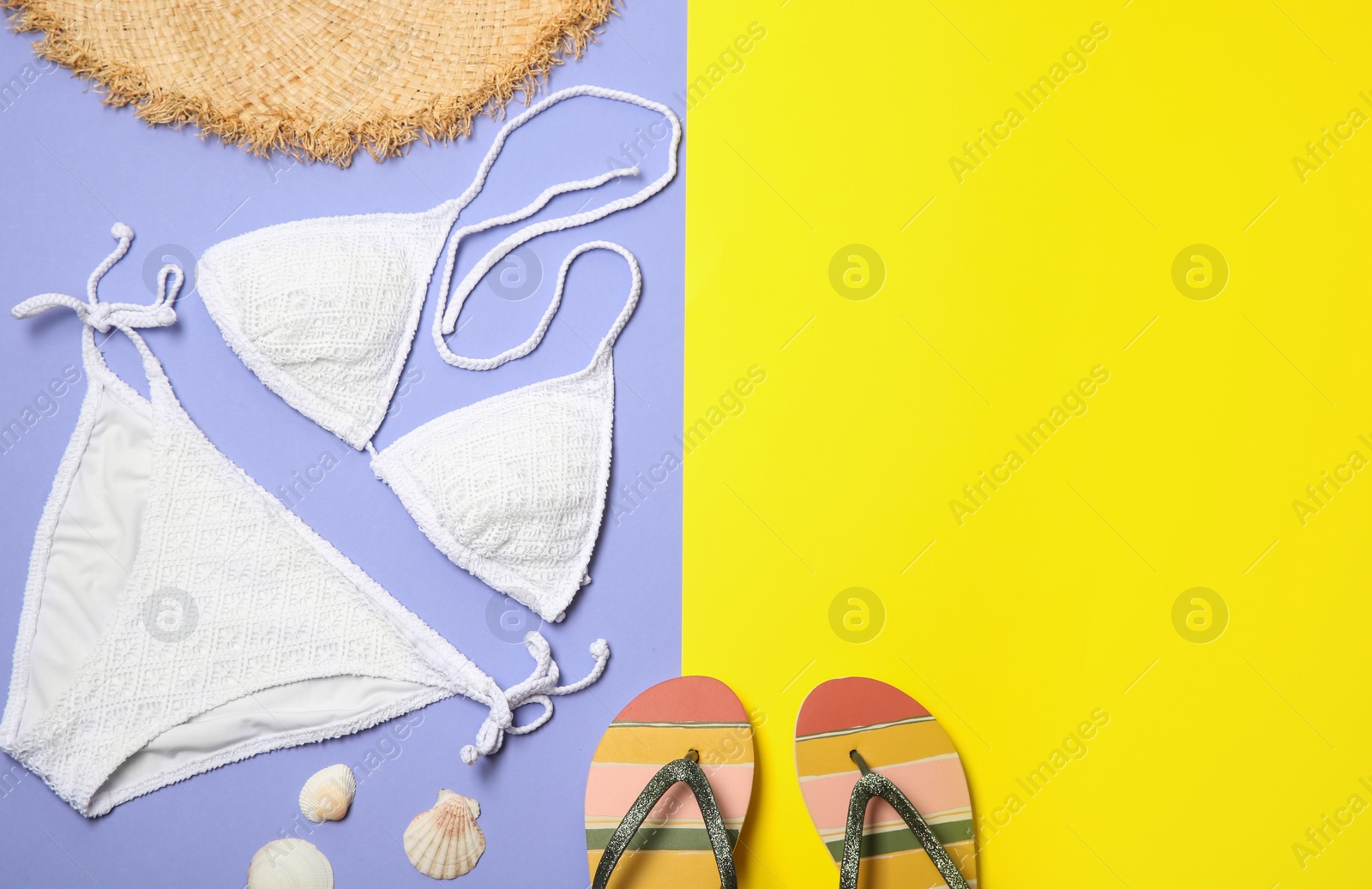 Photo of Flat lay composition with stylish bikini on color background. Space for text