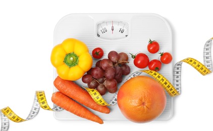 Photo of Scales, healthy food and measuring tape on white background, top view