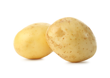 Photo of Fresh raw organic potatoes on white background