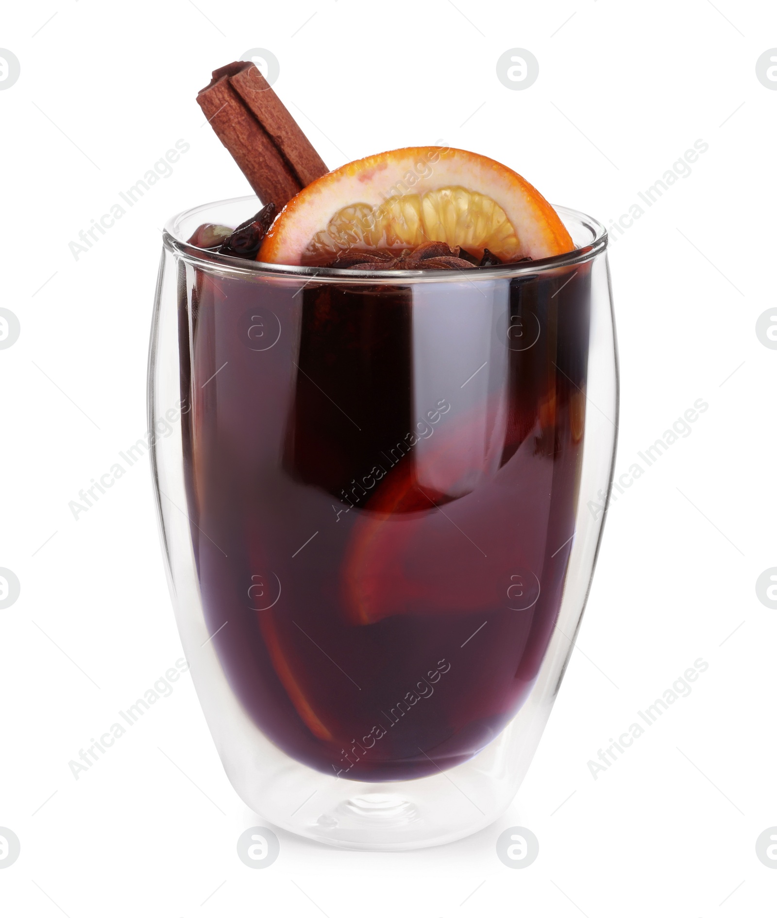 Photo of Aromatic mulled wine in glass isolated on white