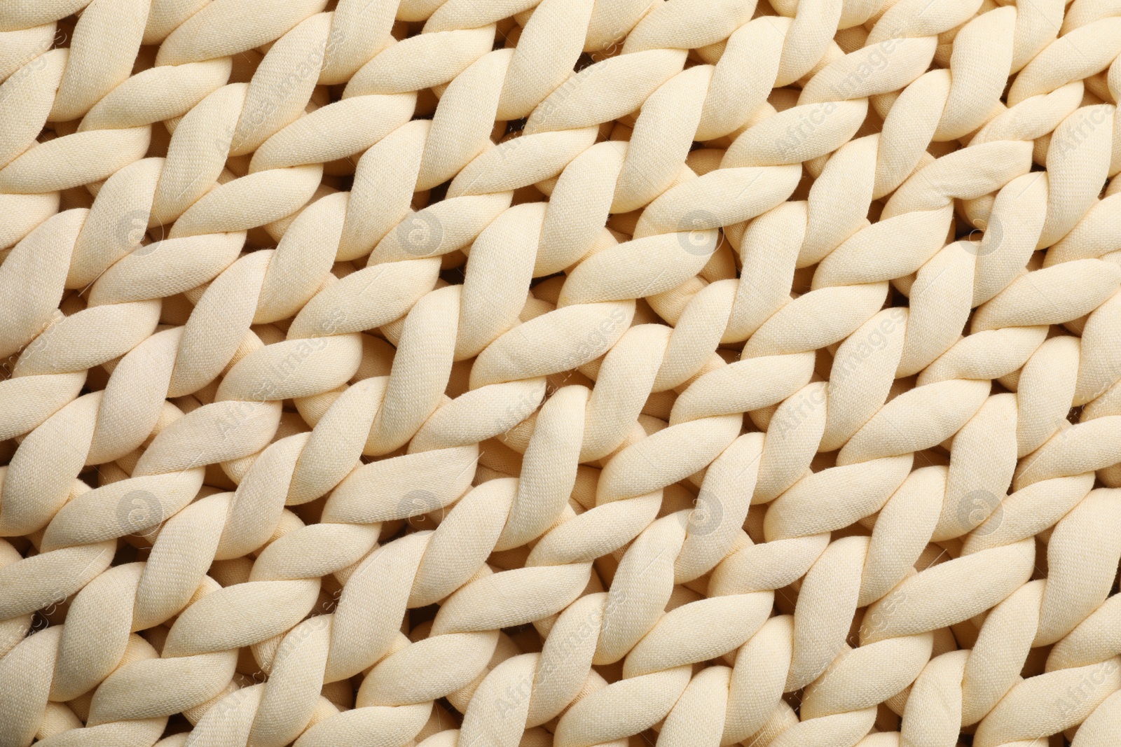 Photo of Chunky knit blankets as background, top view