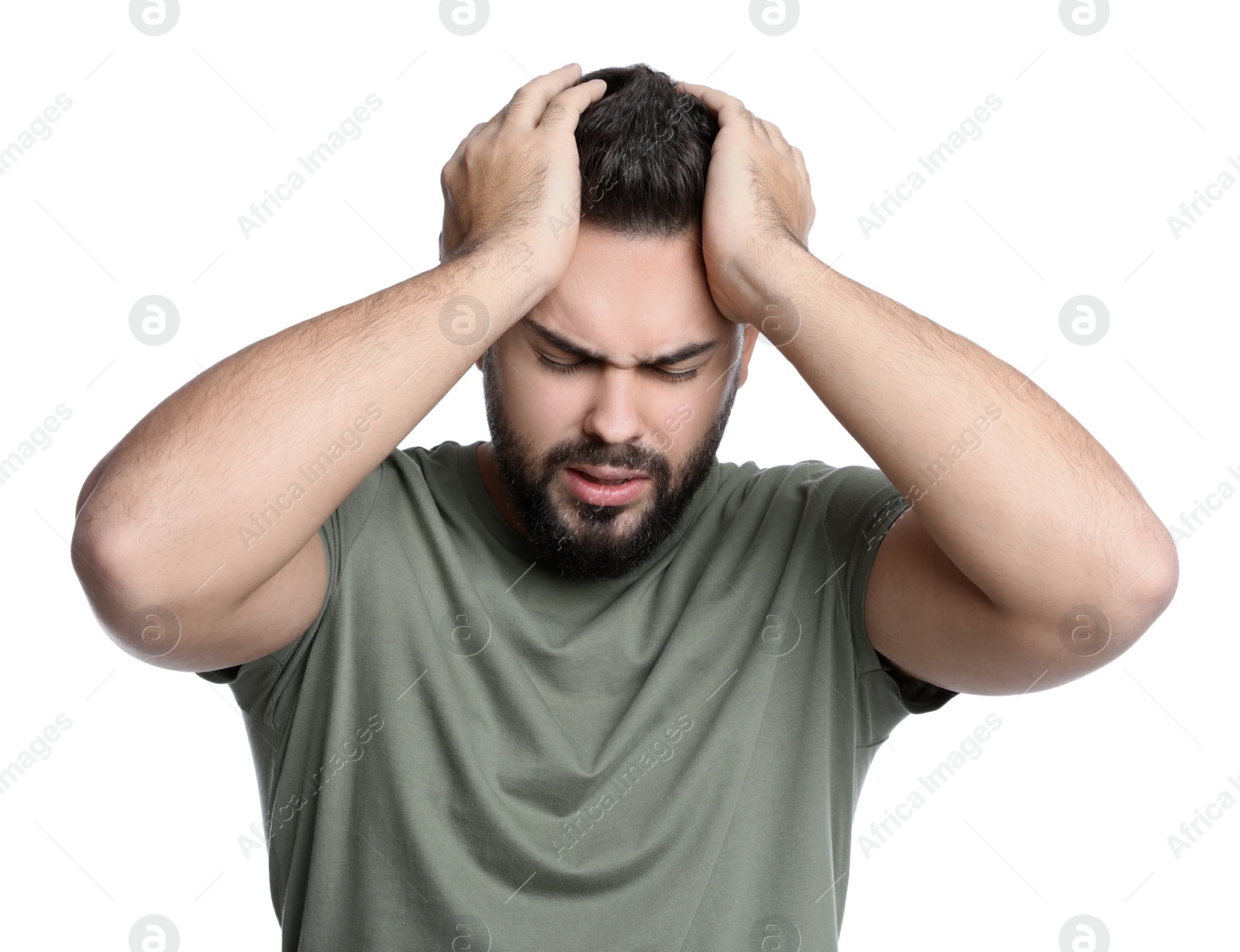 Photo of Young man suffering from headache on white background