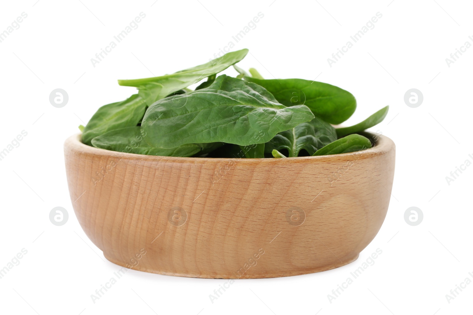 Photo of Bowl of spinach leaves isolated on white