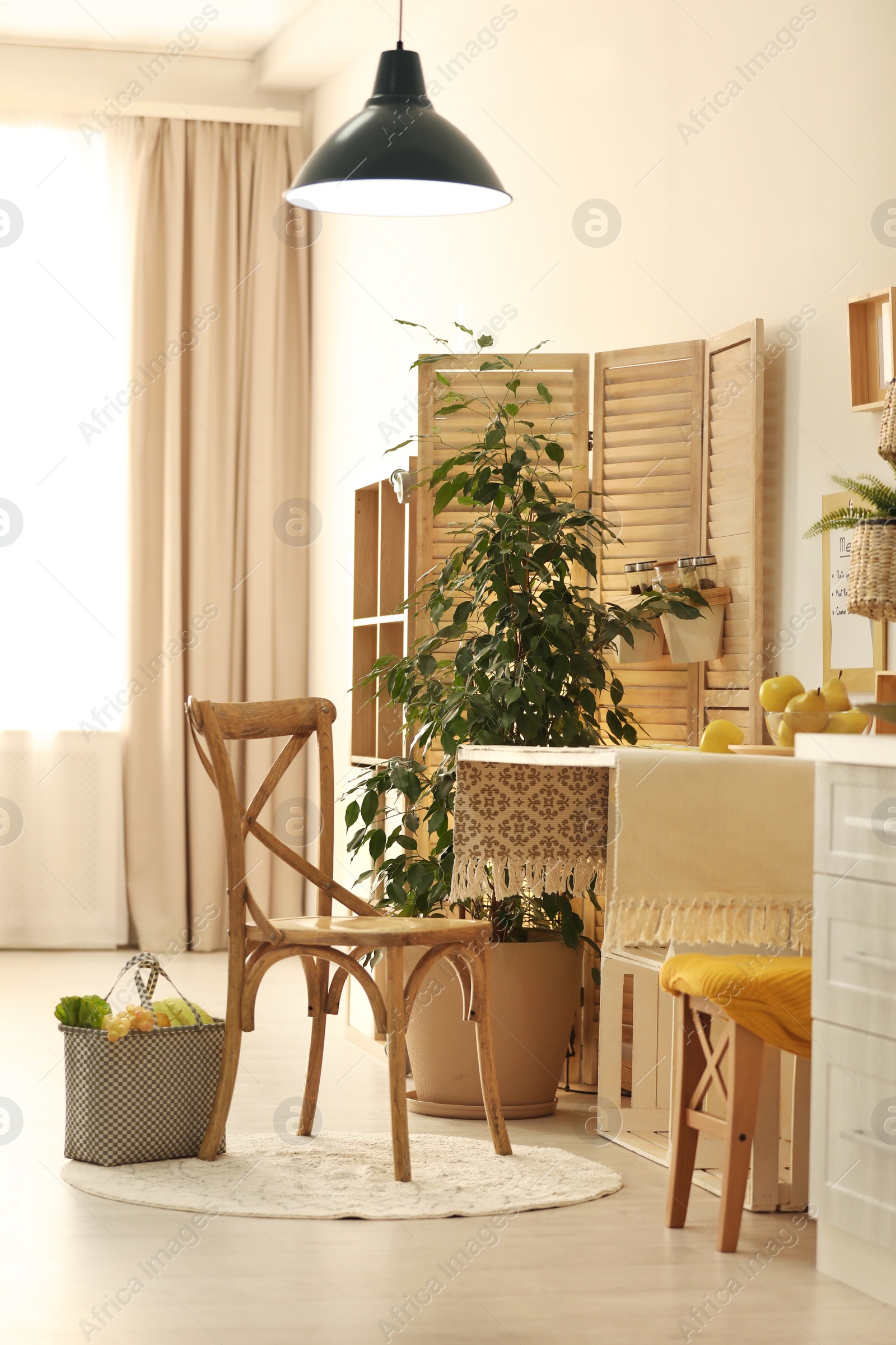 Photo of Modern kitchen interior with wooden crates as eco furniture