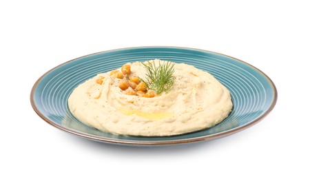 Photo of Plate of tasty hummus with garnish isolated on white