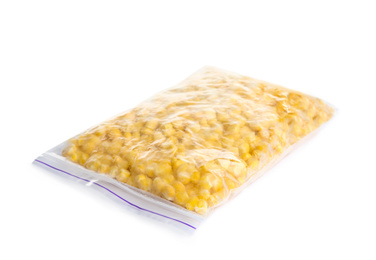 Photo of Frozen corn in plastic bag isolated on white. Vegetable preservation