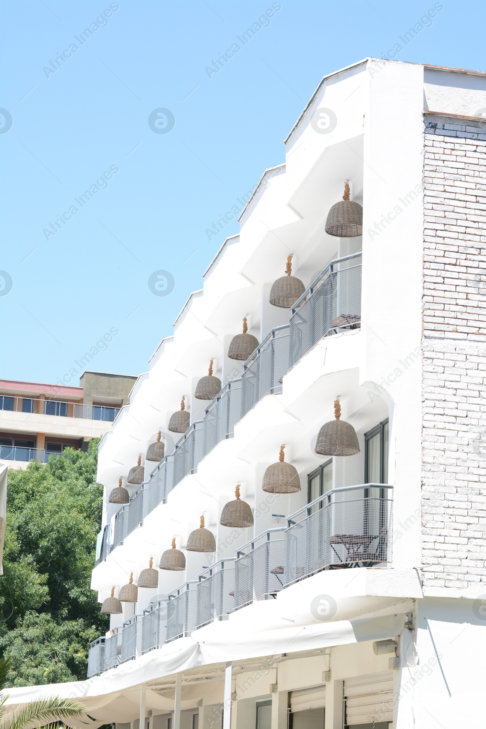 Photo of Exterior of beautiful residential building with balconies