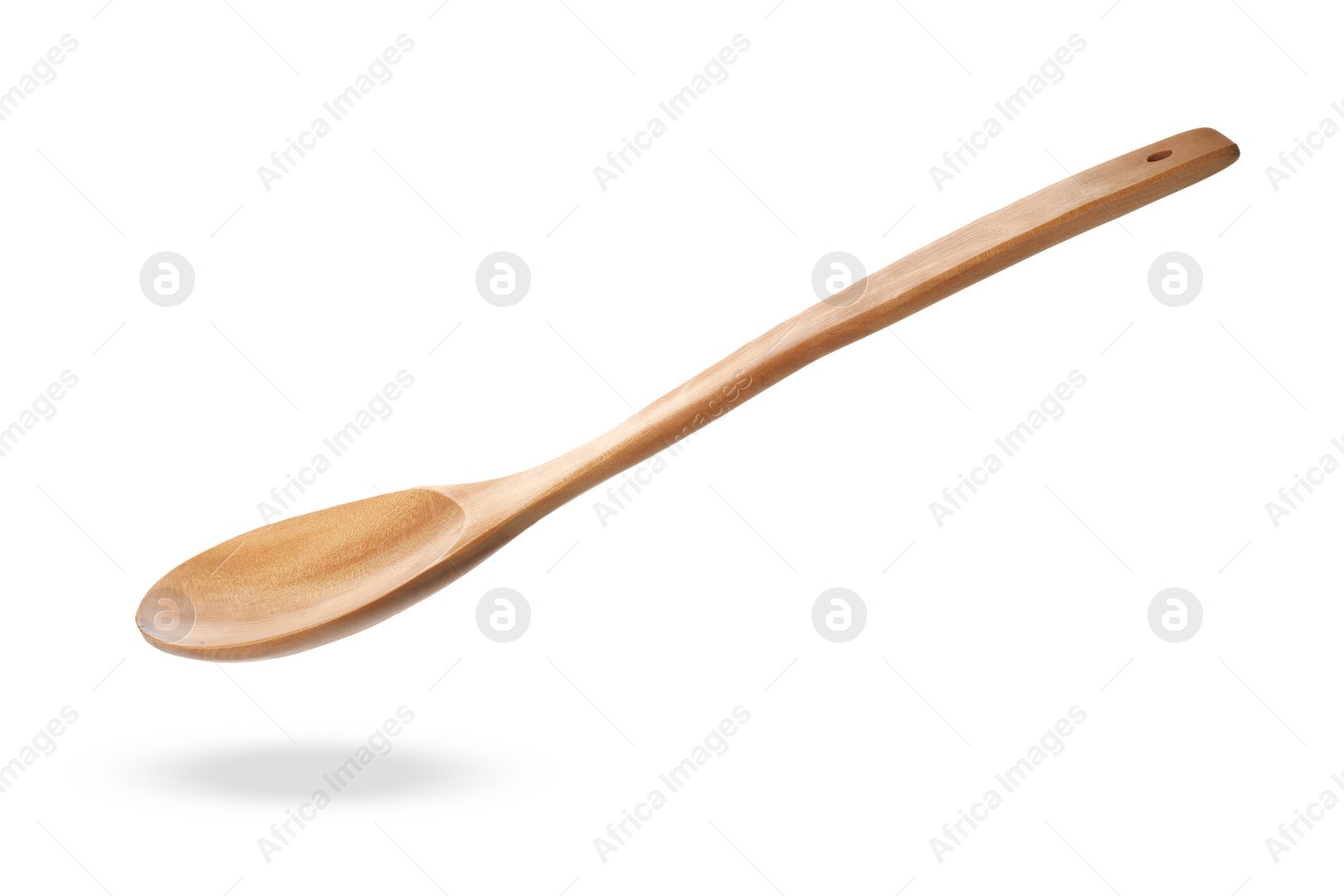 Image of Wooden spoon in air isolated on white