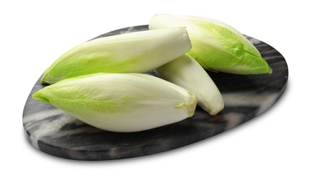 Raw ripe chicories on white background. Belgian endive