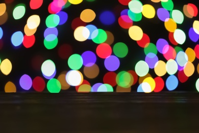 Empty wooden table against bokeh background. Mockup for design