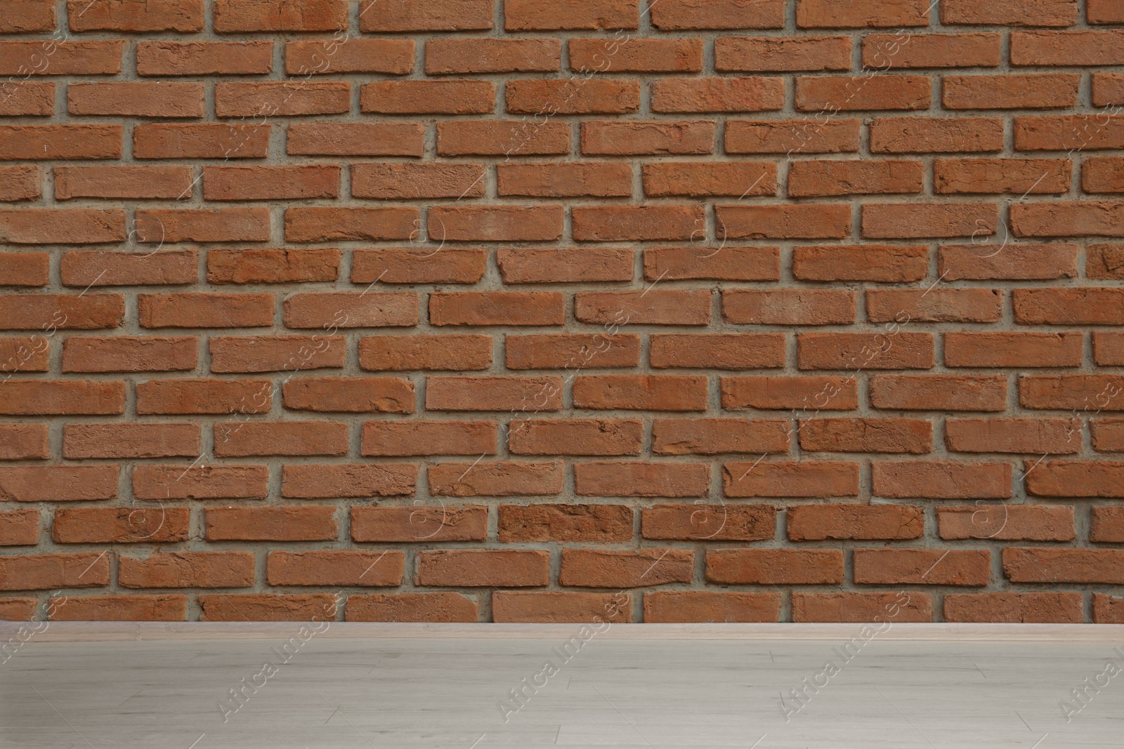 Image of Room with brick wall and wooden floor