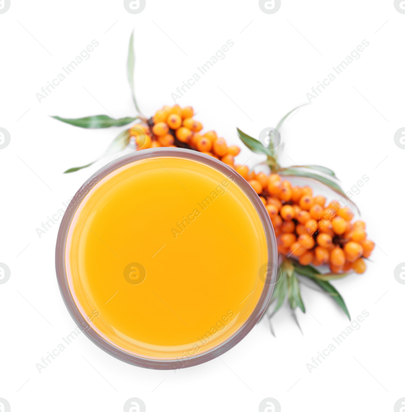 Photo of Delicious sea buckthorn juice and fresh berries isolated on white, top view