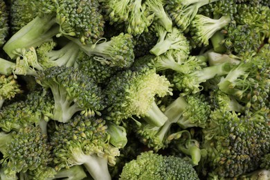 Fresh raw broccoli as background, top view