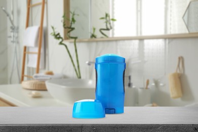 Image of Solid deodorant on grey table in bathroom. Mockup for design