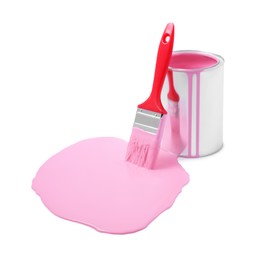 Photo of Spilled pink paint, brush and can on white background
