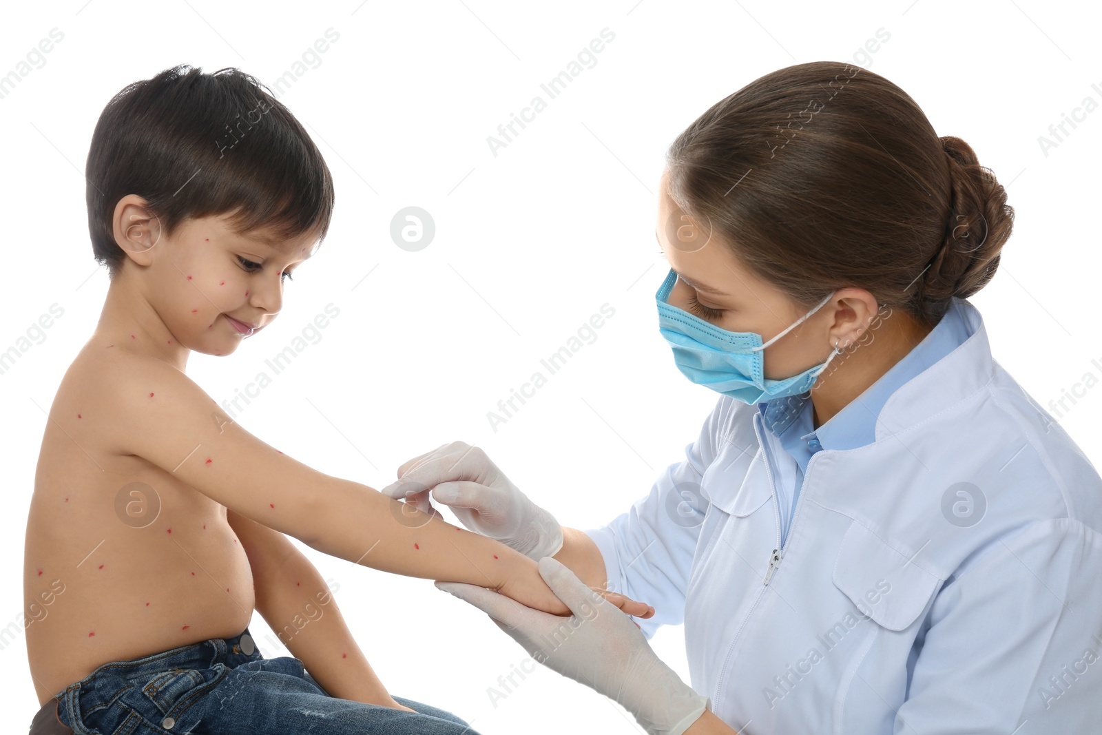 Photo of Doctor examining little boy with chickenpox on white background. Varicella zoster virus