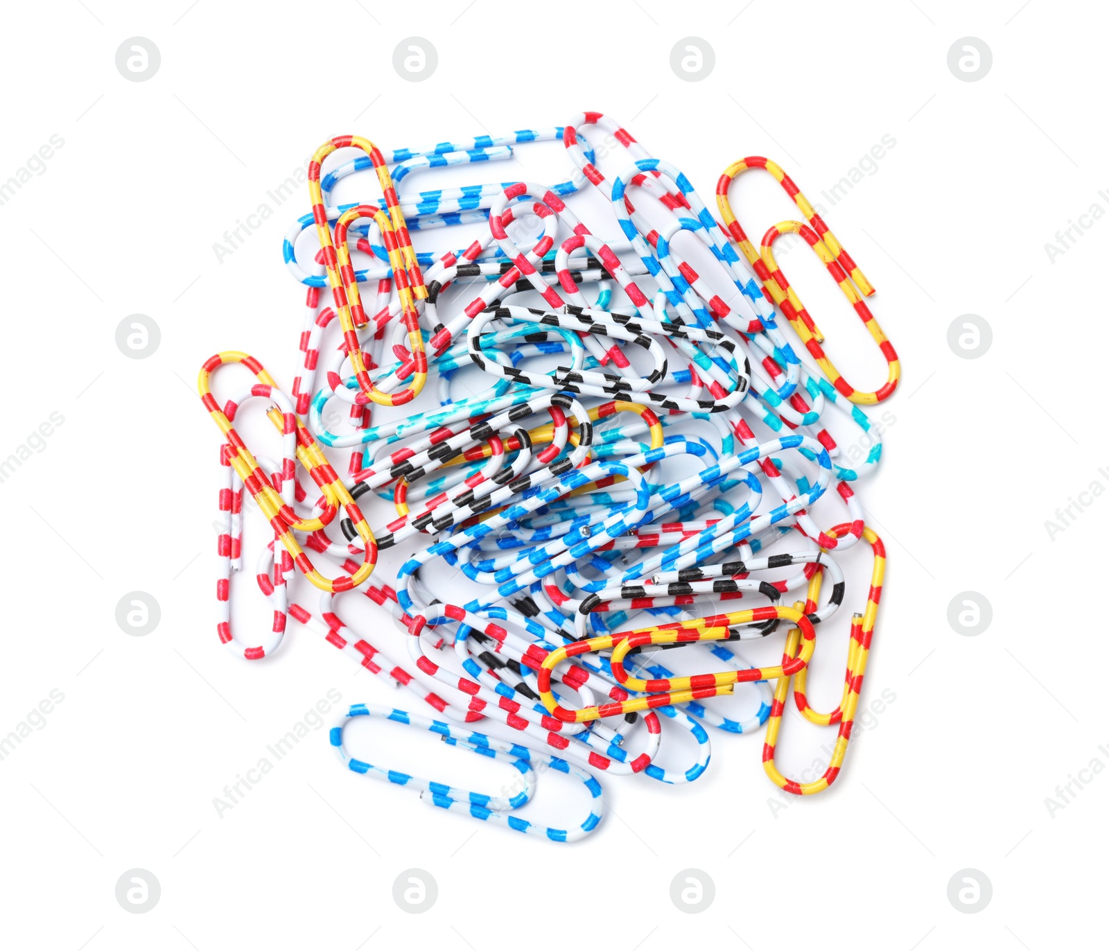 Photo of Heap of paper clips on white background. School stationery