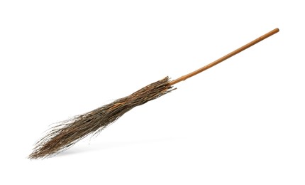 Photo of Old broom with wooden handle isolated on white