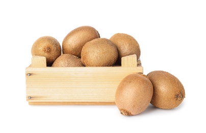 Whole fresh kiwis in wooden crate on white background