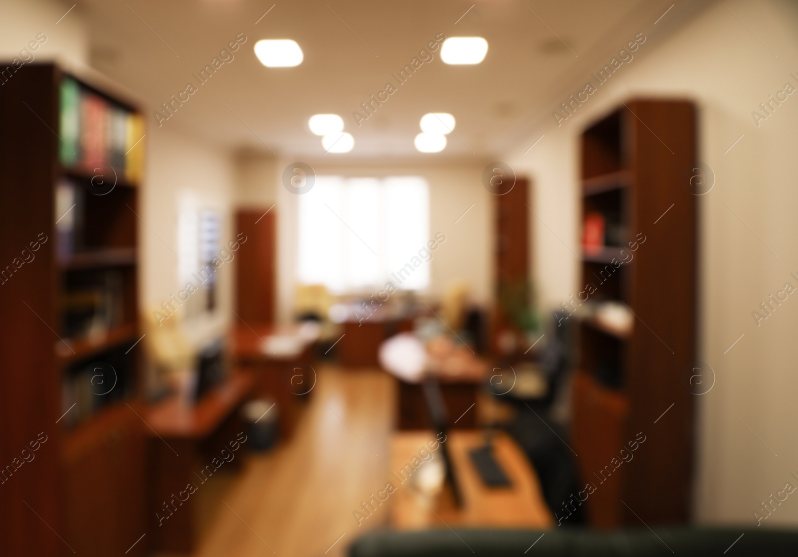 Photo of Blurred view of modern office interior. Bokeh effect