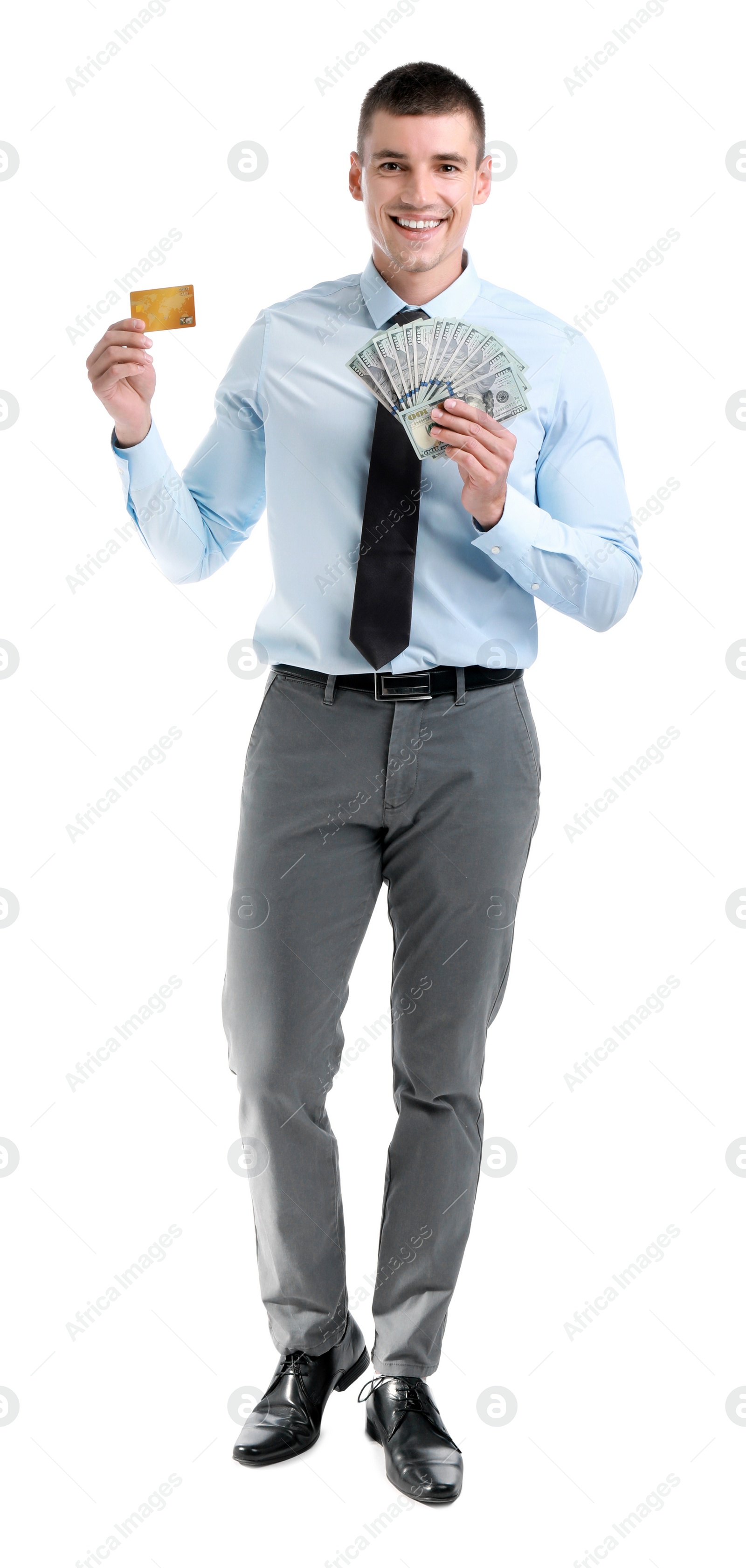 Photo of Handsome businessman with dollars and credit card on white background