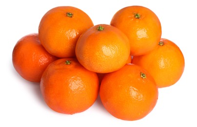 Photo of Many fresh ripe tangerines isolated on white