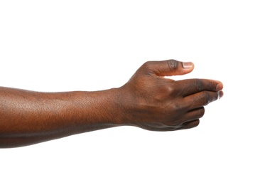 African-American man extending hand for shake on white background, closeup