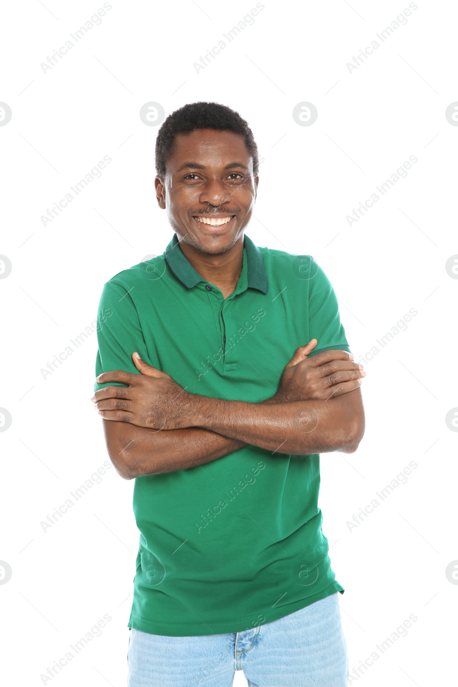 Photo of Young African-American man laughing on white background