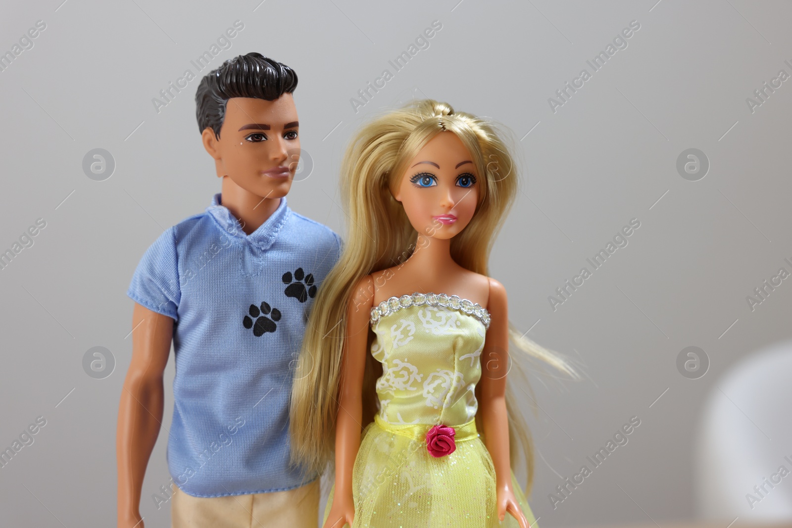 Photo of Leiden, Netherlands - September 20, 2023: Stylish Barbie and Ken dolls on light gray background