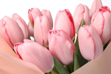 Bouquet of beautiful pink tulips on white background, closeup