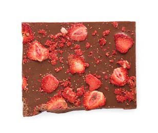 Photo of Half of chocolate bar with freeze dried strawberries isolated on white, top view