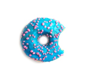 Delicious bitten doughnut with sprinkles on light background