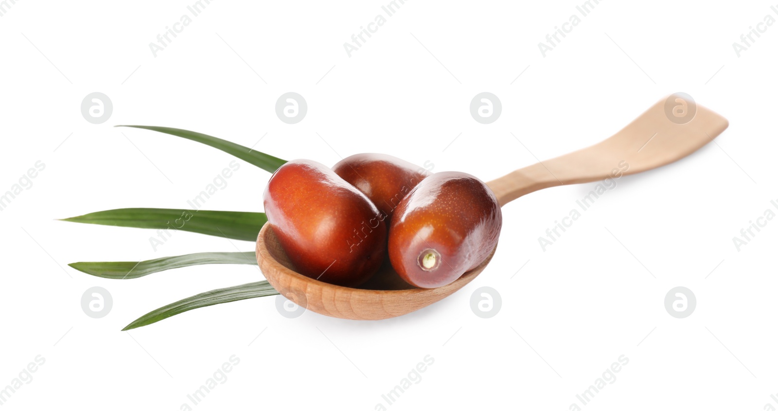 Photo of Fresh ripe oil palm fruits with leaf isolated on white