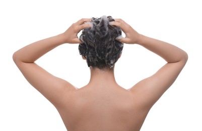 Photo of Woman washing hair on white background, back view