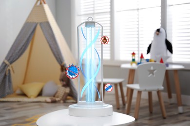 Image of UV sterilizer lamp on table at home